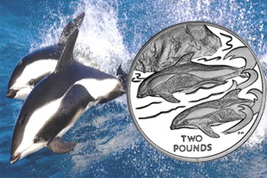 Los delfines cruzados del Territorio Antártico Británico en 2 libras plata